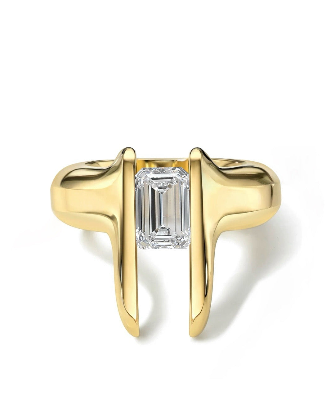 TUSKS EMERALD CUT DIAMOND RING