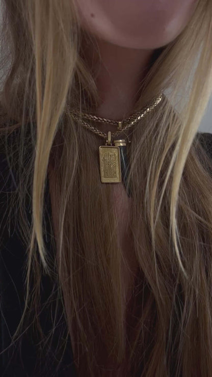 woman wearing moonstone agate charm pendant